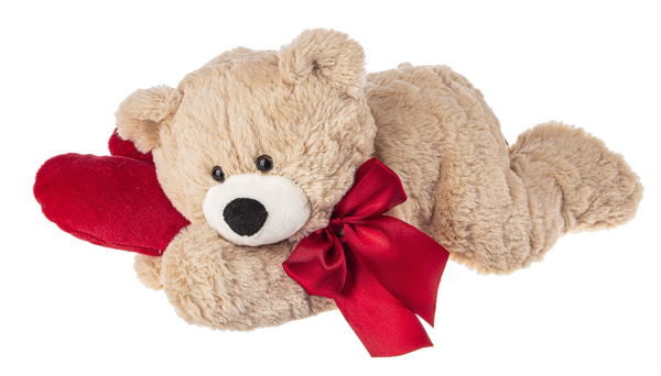 Stuffed bear holding a heart wearing a red bowtie