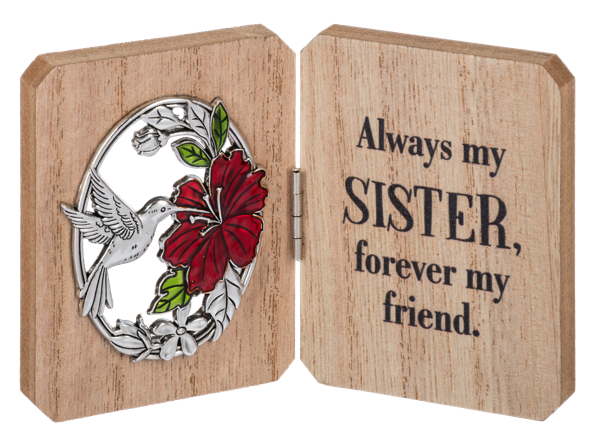 A hummingbird feeding from a red flower on the left side of the mini plaque. On the right side, the message "Always my sister, forever my friend" is engraved.